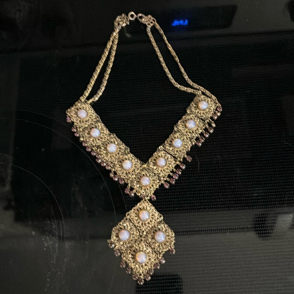 Gold Tone and Faux Opal 20 Inch Necklace with Faux Garnet accents